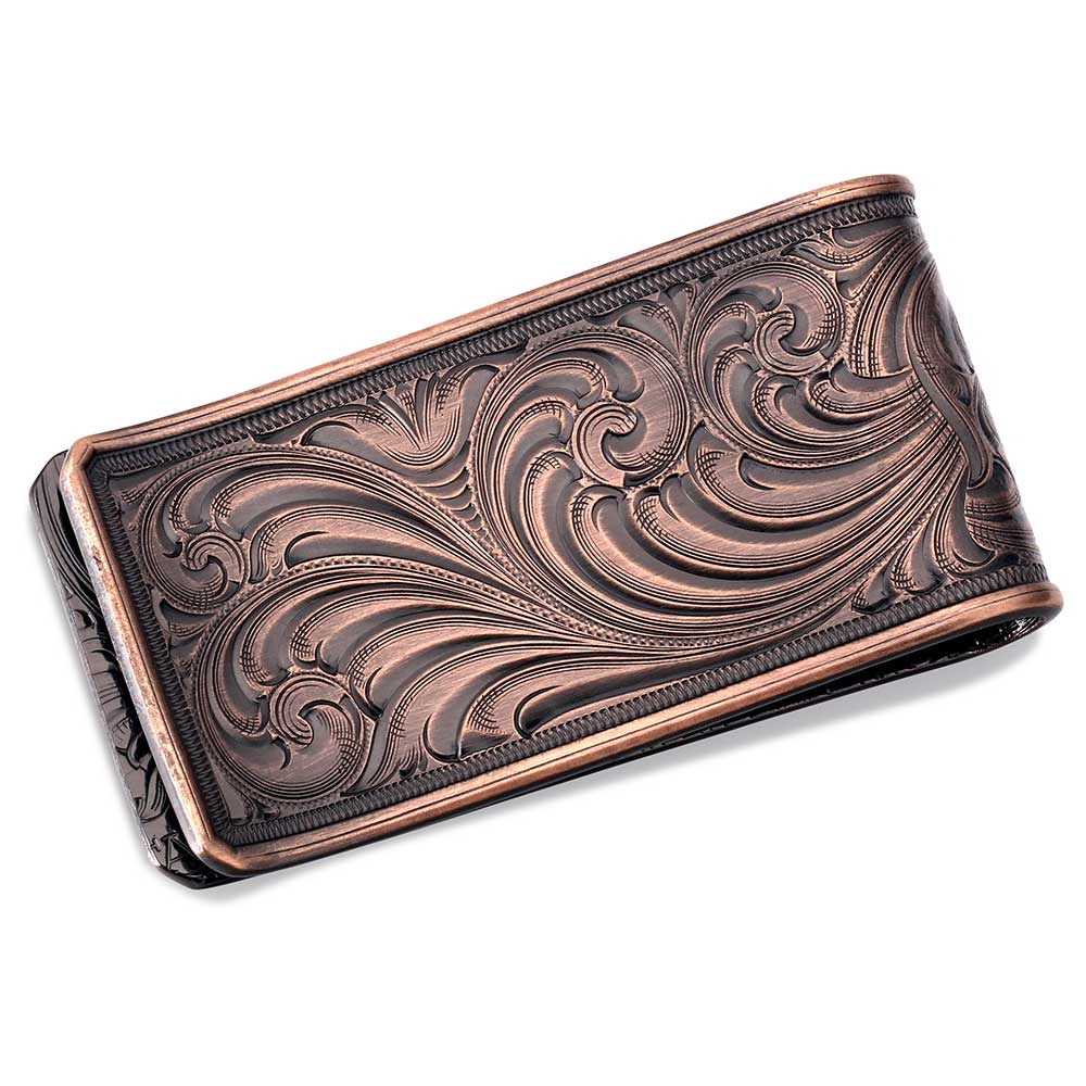 A rectangular money clip in vintage bronze featuring intricate floral scrollwork engravings.