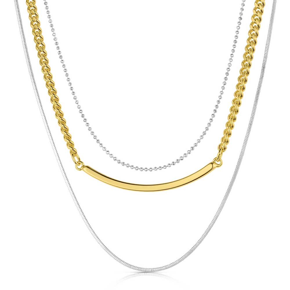 A layered necklace featuring a silver bead chain, a gold link chain with a bar, and a silver chain.