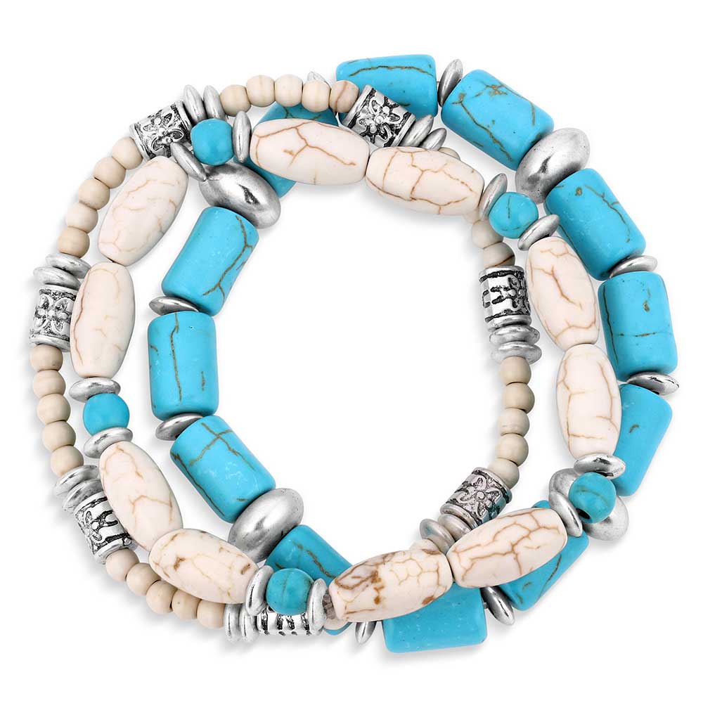 A set of three bracelets featuring turquoise and white howlite beads with silver-toned accents.