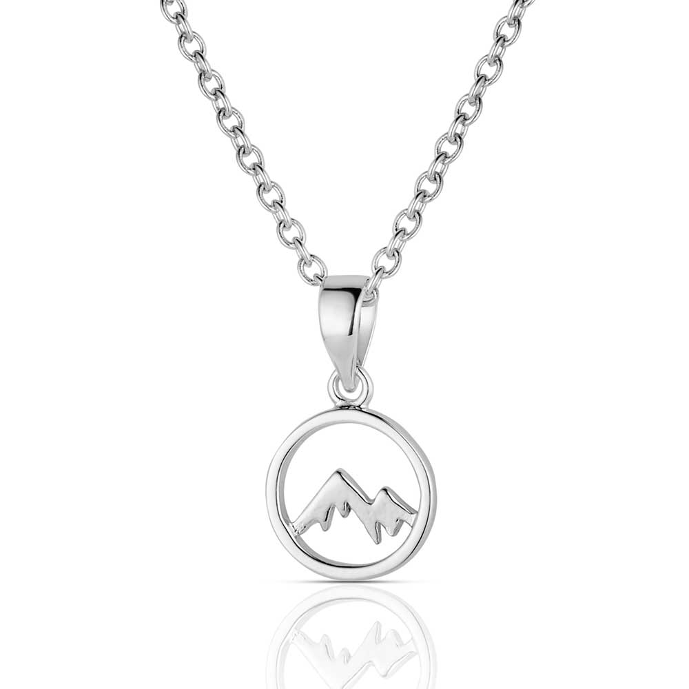 A silver mountain range charm hangs from a delicate chain in this circular pendant necklace.