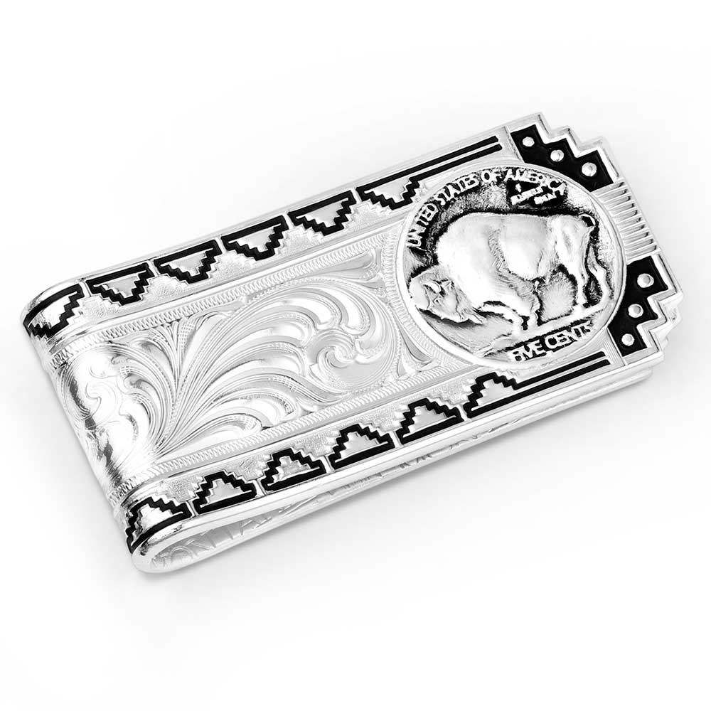 A silver money clip featuring an imitation buffalo nickel and intricate Southwestern engraving.