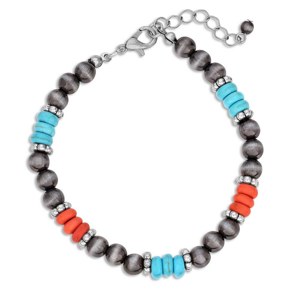 A beaded bracelet featuring silver-tone, turquoise, and coral-colored beads on an adjustable chain.