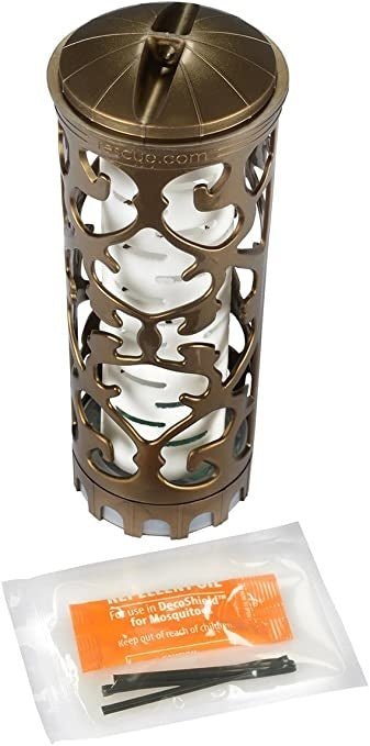 A bronze-colored decorative mosquito repellent lantern with a white inner core and a refill packet.