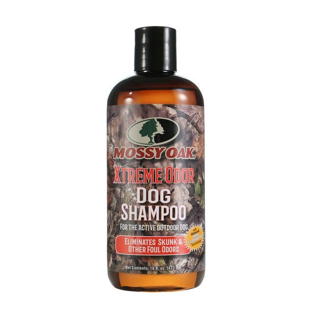 A 16-ounce bottle of Mossy Oak Xtreme Odor dog shampoo with a camouflage label.