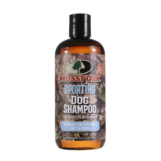 A 16-ounce bottle of Mossy Oak Sporting Dog Shampoo with a camouflage label.