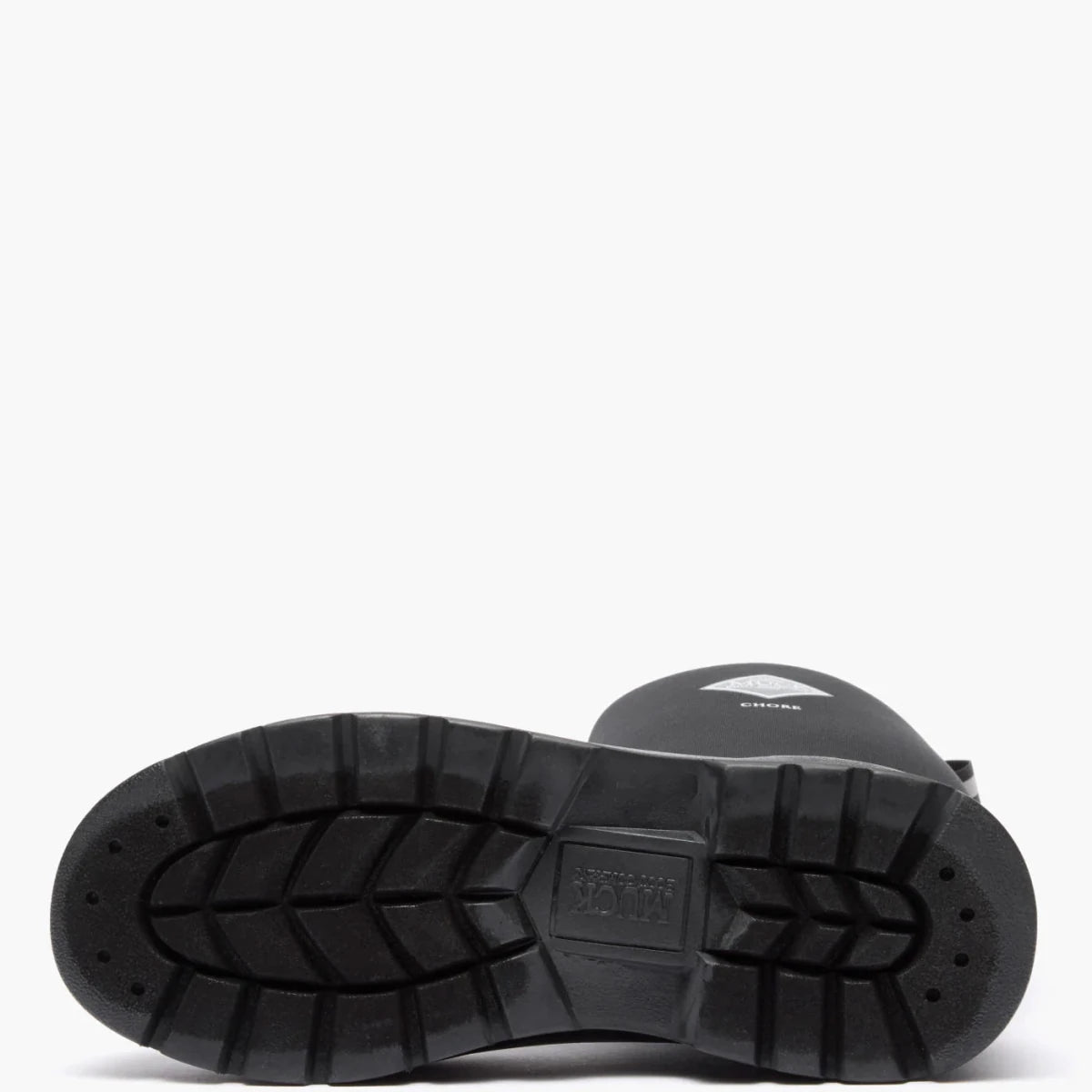 The black rubber sole of a Muck Chore boot features a rugged tread pattern and brand logo.