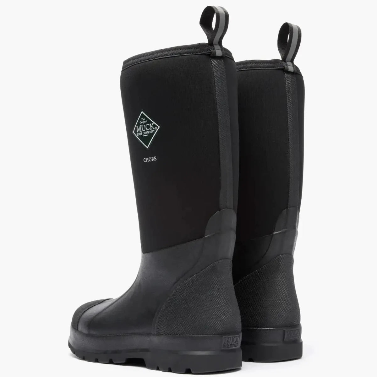 A pair of black Muck Chore rubber work boots shown from a rear three-quarter angle.