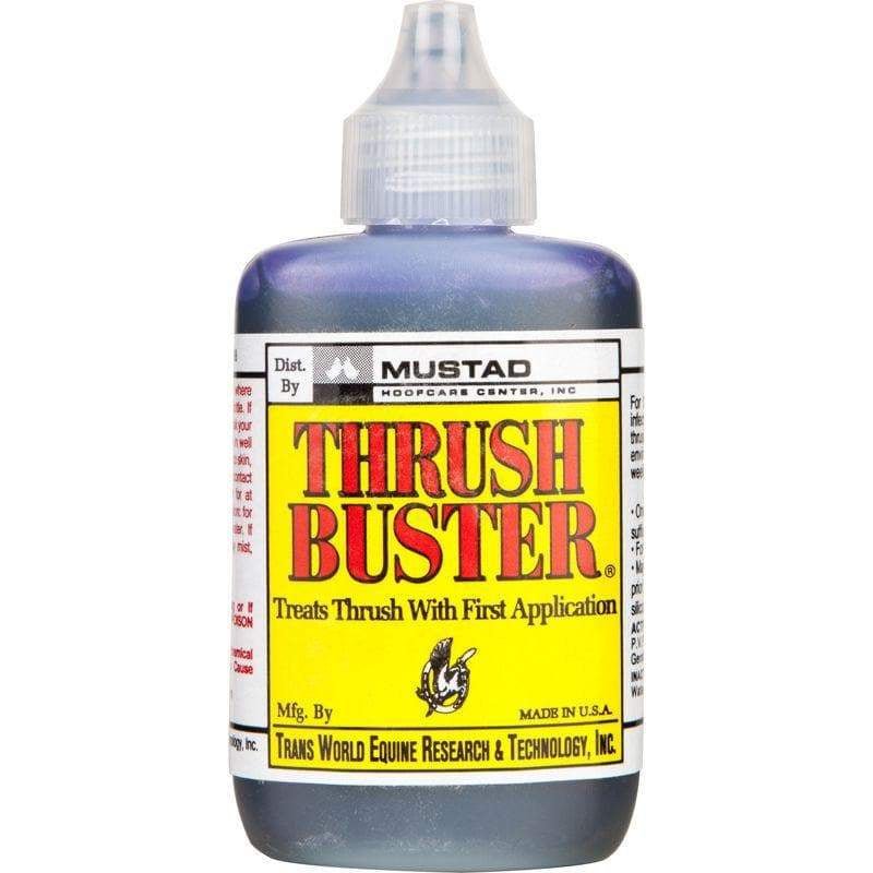 A bottle of Mustad Thrush Buster treatment with a clear applicator tip.
