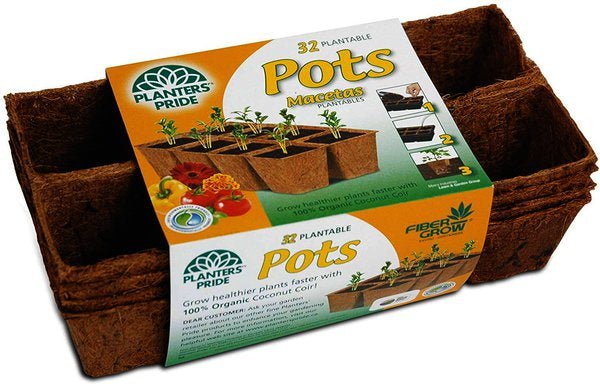 A stack of brown, rectangular coconut coir plantable pots wrapped in a product label.