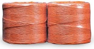 Two spools of orange poly twine sitting side by side.