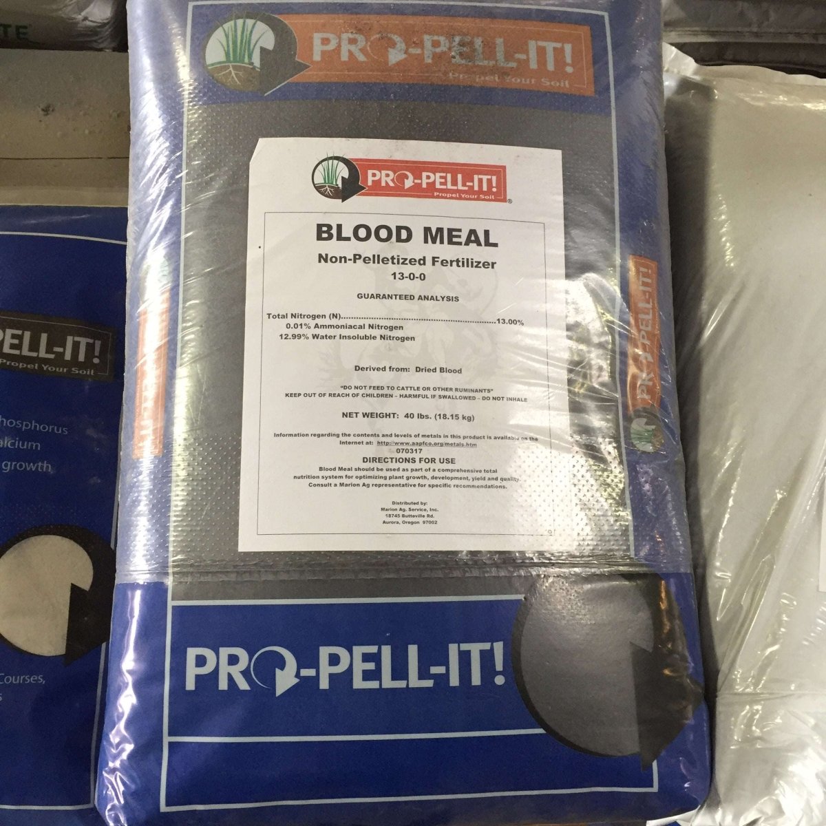 A forty-pound bag of Pro-Pell-It Blood Meal 13-0-0 fertilizer.