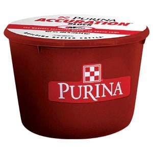 A red Purina Accuration cattle tub with a white lid and the Purina logo on the side.