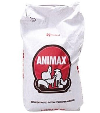 A white bag of Purina Animax concentrated ration for farm animals with a red logo.