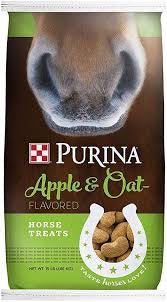 A bag of Purina Apple and Oat flavored horse treats featuring a horse nose at the top.