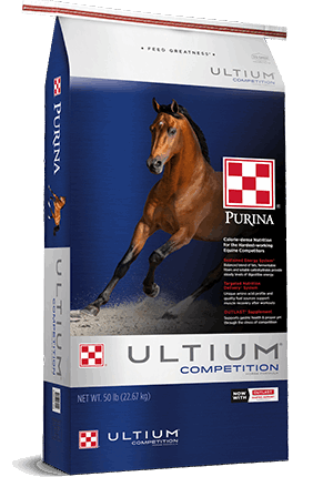 A fifty-pound bag of Purina Ultium Competition horse feed featuring a brown horse in motion.