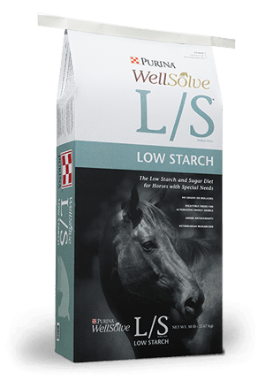 A fifty-pound bag of Purina WellSolve L/S low starch horse feed featuring a horse portrait.