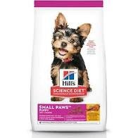 A bag of Hill's Science Diet Small and Mini puppy dry dog food featuring a small puppy.
