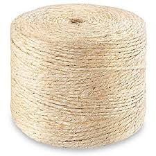 A spool of natural, light brown sisal twine with a rugged, fibrous texture.
