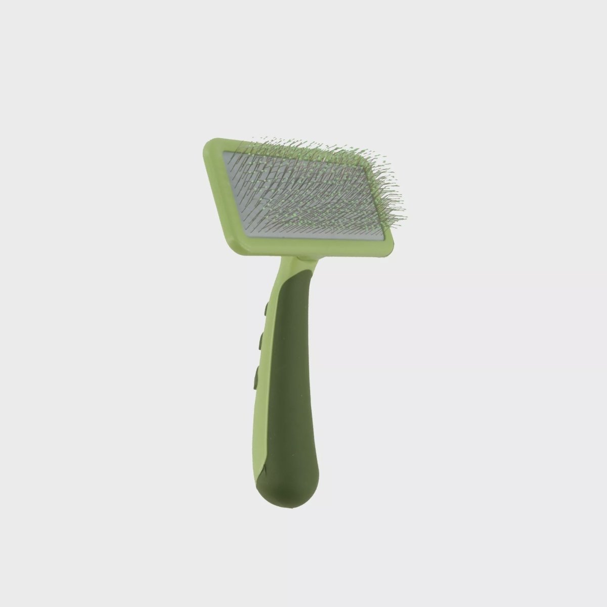 A small green slicker brush for dogs with a non-slip handle and stainless steel pins.