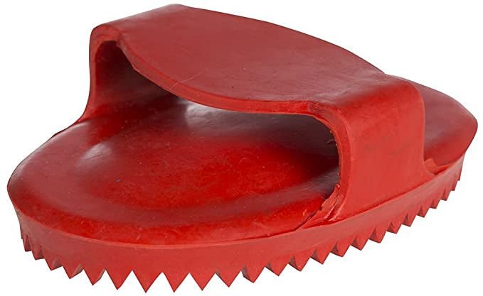A red rubber curry comb with a built-in handle and a serrated edge for grooming.
