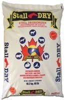 A 40-pound bag of Stall Dry absorbent and deodorizer featuring a maple leaf logo.