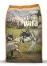 A bag of Taste of the Wild High Prairie Puppy dog food featuring an illustration of wolves.