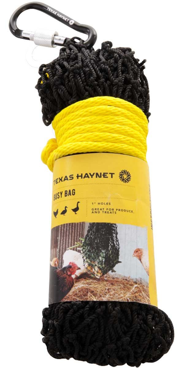 A black nylon mesh chicken treat bag with a yellow label and a metal carabiner at the top.