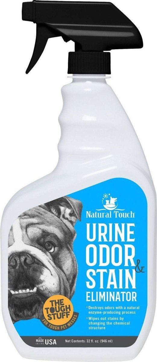 A 32-ounce spray bottle of Tough Stuff urine odor and stain eliminator featuring a bulldog image.