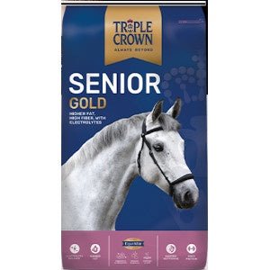 A bag of Triple Crown Senior Gold horse feed featuring a white horse on a blue background.