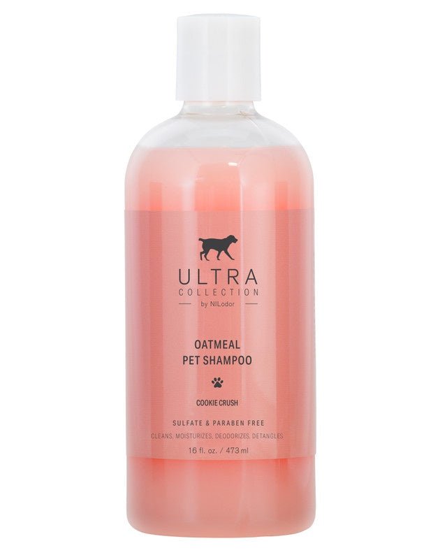 A 16-ounce bottle of Ultra Collection Cookie Crush oatmeal pet shampoo with pink liquid.