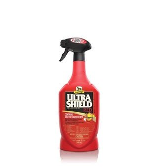 A red spray bottle of UltraShield Red all weather repellent fly spray.