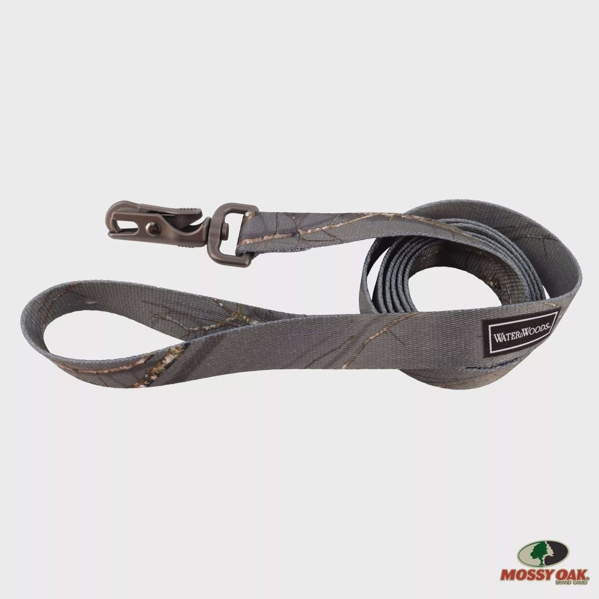 A grey camouflage patterned dog leash with a metal scissor snap and a Water and Woods brand tag.