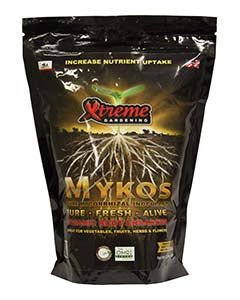 A 2.2 pound bag of Xtreme Gardening Mykos mycorrhizae powder with a plant root illustration.