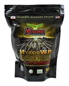 A black bag of Xtreme Gardening Mykos Wettable Powder with a plant root illustration.