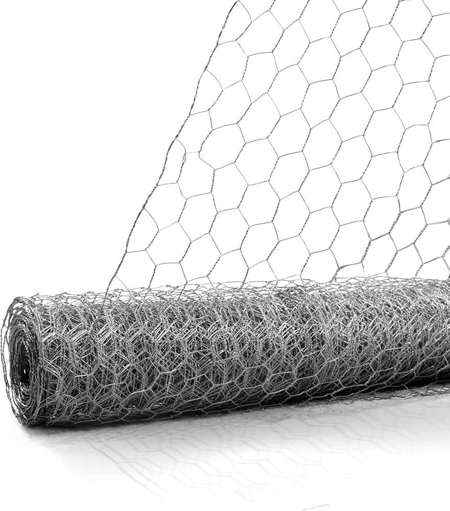 A roll of silver-colored hexagonal poultry netting fencing stands against a white background.
