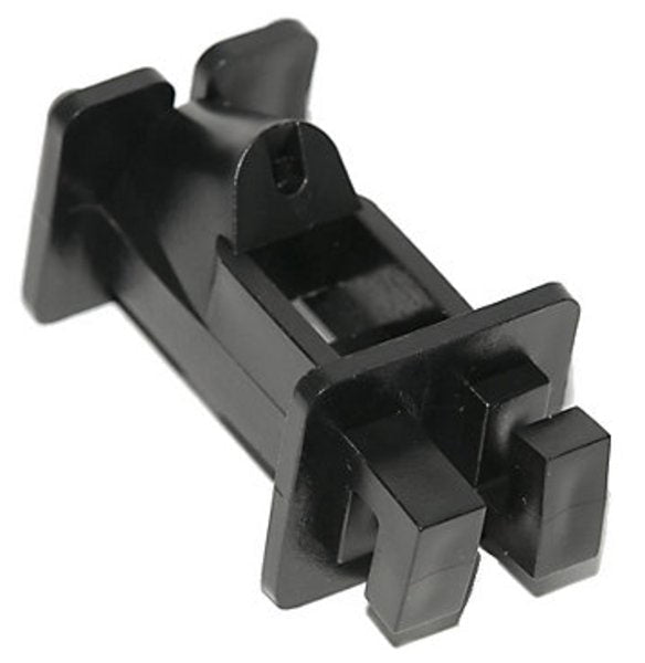 A black plastic slant nail insulator designed to hold electric fencing wire away from wooden posts.
