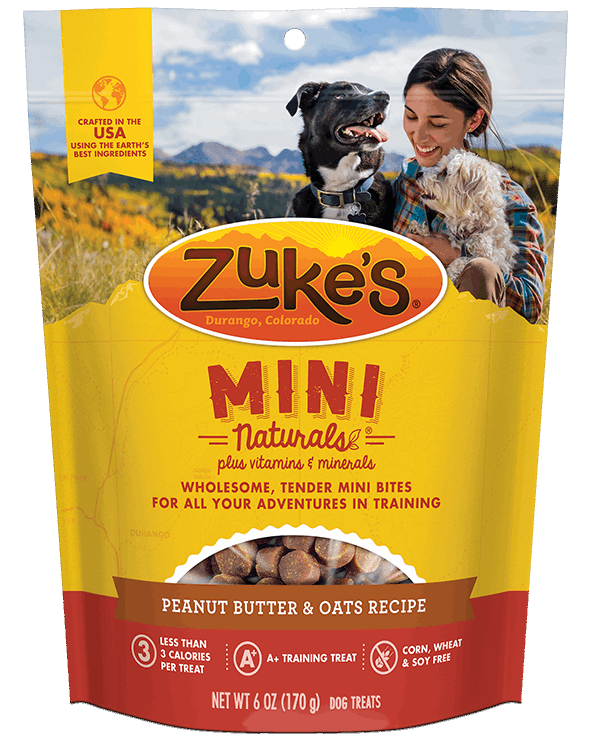 A bag of Zuke's Mini Naturals peanut butter and oats dog treats.